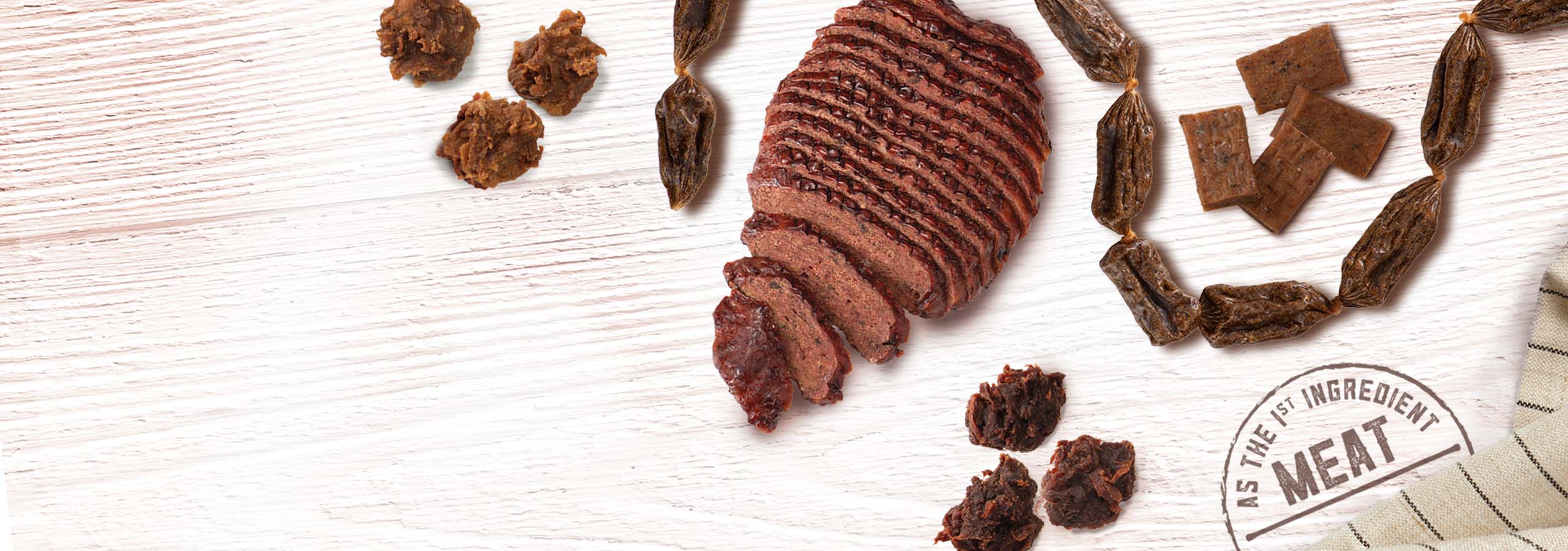 Zoë Meat Market treats displayed on white table