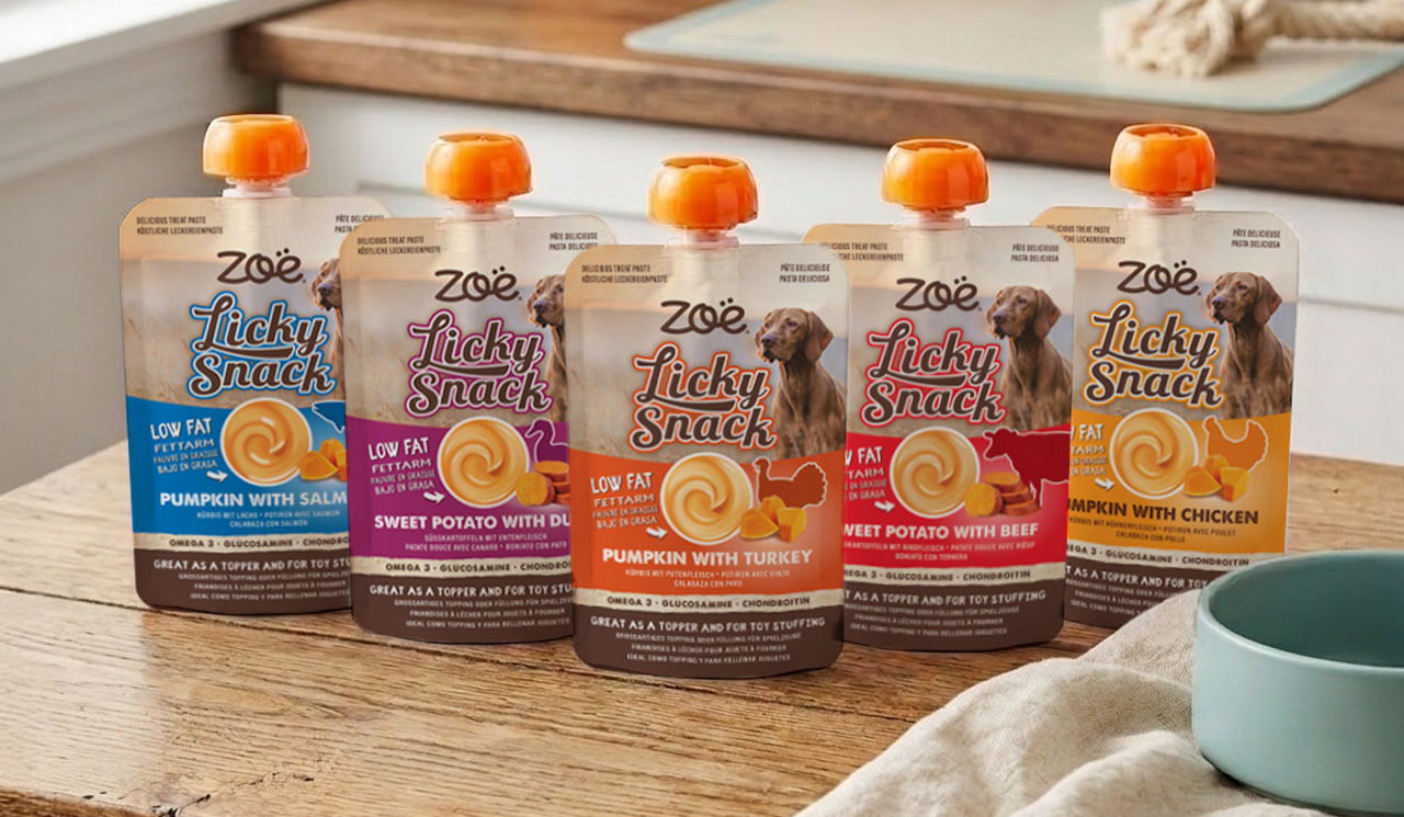 Line up of the 5 Zoë Licky Snack flavours on a wooden kitchen table top