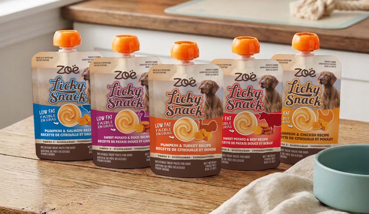 Line up of the 5 Zoë Licky Snack flavours on a wooden kitchen table top