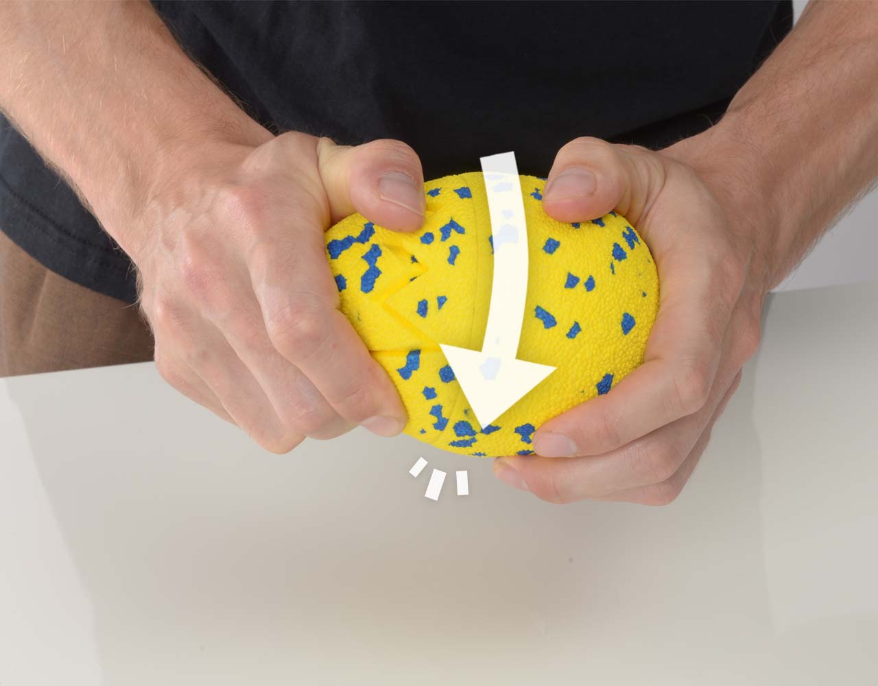 2 hands screwing the top shut until a bump or snap is felt.